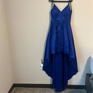 This beautiful navy blue dress is for sale. It has only been work about 6 times.
